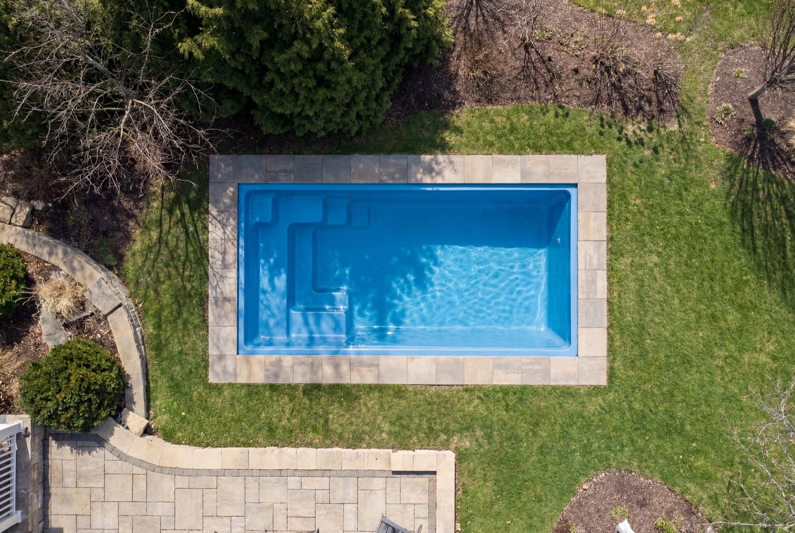 Aerial drone render of rectangular pool